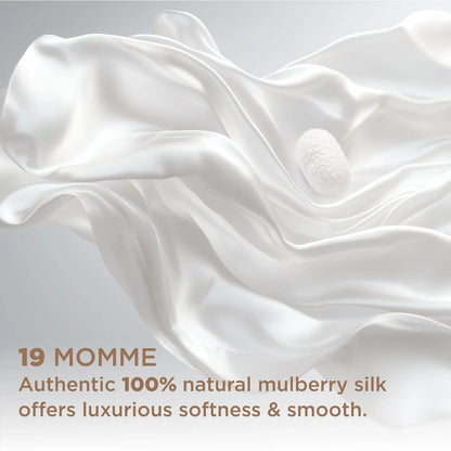 White silk fabric with a stone on a light gray background, featuring text about silk quality.