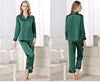 Green outfit with matching pants and top on a white background