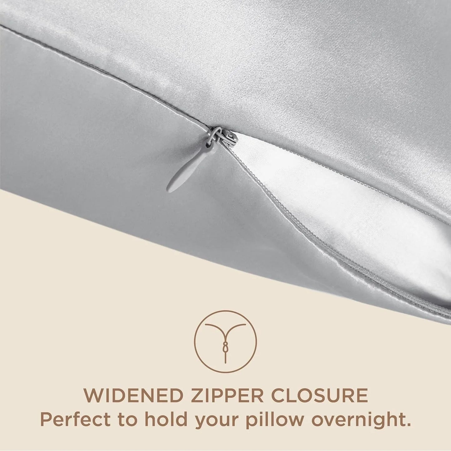 Silver pillow with widened zipper closure on a beige background