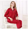 Woman wearing a red outfit sitting on a chair