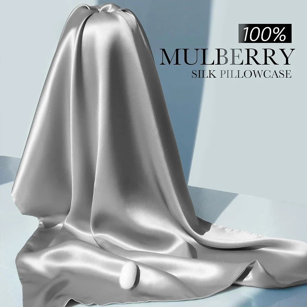 Silk pillowcase with '100% Mulberry Silk' text on a light blue background